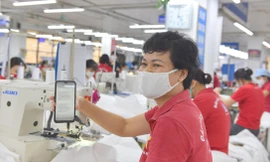 NLĐ tham gia BHXH được nhận hỗ trợ từ Quỹ bảo hiểm thất nghiệp. Ảnh: Như Ý