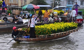 Đã thấy mùi Tết tràn khắp nơi, nhớ ba ngồi nướng khô cá lóc thơm nức mũi