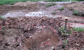 Di dời mộ bị san lấp sang nghĩa trang mới