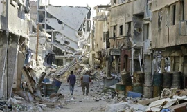 Cảnh tàn phá sau các cuộc xung đột ở Damascus, Syria ngày 3/11. (Ảnh: AFP/TTXVN)