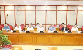 Tổng Bí thư Nguyễn Phú Trọng (giữa) chủ trì cuộc họp. (Ảnh: Trí Dũng/TTXVN)