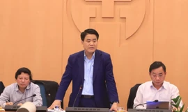 Chủ tịch UBND TP Hà Nội Nguyễn Đức Chung tại một buổi họp báo chống dịch COVID-19