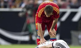 Chấn thương đã cướp cơ hội dự World Cup của Reus (áo trắng) vào phút cuối.