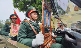 Tang lễ cho 13 liệt sĩ được tổ chức tại Bệnh viện Quân y 268. Ảnh: Zing