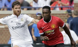 Xabi Alonso (áo sáng) bị HLV Carlo Ancelotti chê béo.