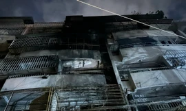 Hiện trường vụ cháy cư xá ở TP.HCM khiến 8 người tử vong