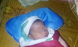 Bé trai sơ sinh bị bỏ rơi khi bão chuẩn bị đổ bộ