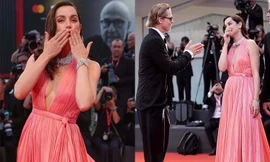 Bond Girl gốc Cuba mặc mốt không nội y, cười đùa với Brad Pitt trên thảm đỏ LHP Venice