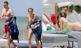 Thủ môn Arsenal ‘khóa môi’ bạn gái sexy trên bãi biển