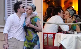 Cậu cả nhà Beckham ôm hôn không ngừng bà xã trên phố