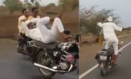 Cụ ông đứng trên yên xe máy nhảy múa phóng băng băng trên cao tốc