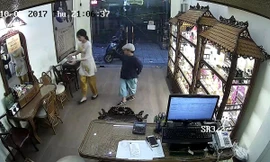 Bé trai 10 tuổi theo 'cha' dàn cảnh ăn trộm cả chục cửa hàng