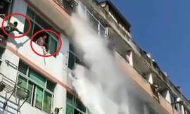 Lính cứu hỏa 'hạ gục' cô gái đòi tự tử trong 10 giây