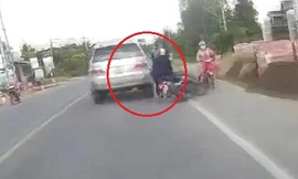 Tránh phụ nữ đi ngược chiều, xe máy va vào ô tô ngã nhào trên quốc lộ