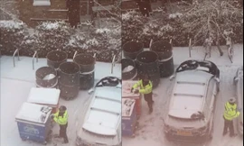 Bất chấp bão lớn, cảnh sát Anh vô tư chơi ném tuyết trước ca trực