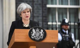 Thủ tướng Anh Theresa May phát biểu trên phố Downing sáng 4/6, vài tiếng sau vụ khủng bố tối 3/6 tại London. Ảnh: Getty Image