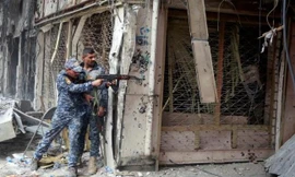 Binh sĩ Iraq tìm diệt chiến binh IS tai Mosul hôm 7/7. Ảnh: Reuters