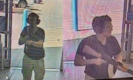 Khoảnh khắc nghi phạm ập vào siêu thị. Ảnh: CCTV