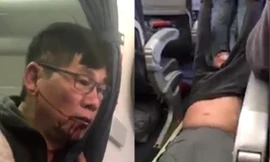 Cảnh ông David Dao bị kéo khỏi máy bay trong đoạn video gây xôn xao dư luận.