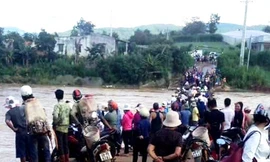 Ba mẹ con rơi xuống sông, bé 8 tuổi bị nước cuốn mất tích