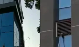 Tròn mắt nhìn tiền rơi từng cọc từ cửa sổ toà nhà cao tầng