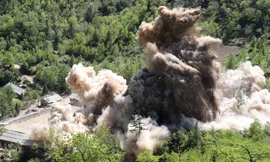 Một phần bãi thử bị cho phát nổ ngày 24/5. Ảnh: Reuters