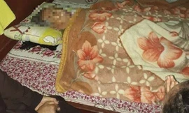 Cụ bà M. đã bất ngờ tỉnh lại khi đang được lo hậu sự khiến cả gia đình ngỡ ngàng vui mừng. (Ảnh: CTV)