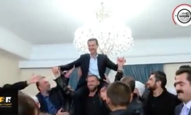 Ăn mừng giải phóng, cư dân Syria nâng Tổng thống Assad trên vai
