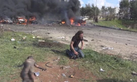 Bức ảnh gây xúc động của Ahmad Primo. Nhân vật chính trong bức ảnh là phóng viên chiến trường Abd Alkader Habak. 