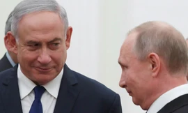 Tổng thống Nga Putin (phải) và Thủ tướng Israel Netanyahu (trái). Ảnh: Reuters