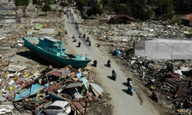 Palu tan hoang sau động đất. Ảnh: AFP
