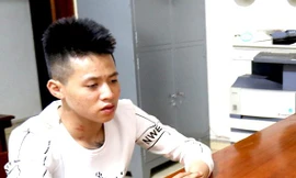 Đối tượng Vỹ tại trụ sở công an