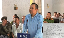 Bị cáo Y Tuyến tại phiên xét xử phúc thẩm và giấy biên nhận tiền