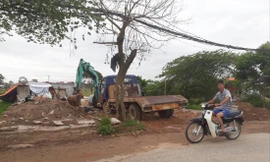 Nhà xưởng xây dựng trên đất nông nghiệp ở xã Kim Lũ (Sóc Sơn, Hà Nội) bị tháo dỡ Ảnh: Nguyễn Thắng