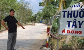 Ðoạn đường do ông Nguyễn Bá Tùng tự bỏ tiền đầu tư trên đất nhà, nhưng không đền bù, giải tỏa theo quy định