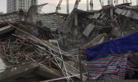 Hiện trường vụ sập đổ công trình tại dự án trường mầm non Vườn Xanh sáng nay.