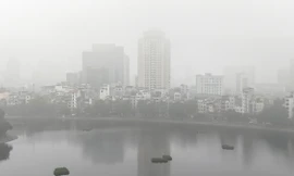 Hà Nội chìm trong mưa phùn, nồm ẩm kéo dài