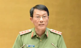 Bộ trưởng Công an Lương Tam Quang trình Quốc hội dự án Luật Phòng, chống mua bán người