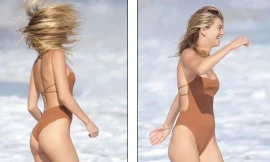 Nàng mẫu Úc đẹp nuột nà ở biển với áo tắm