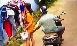 Cô gái bị đối tượng sàm sở khi đang phơi đồ đã bị camera ghi lại.