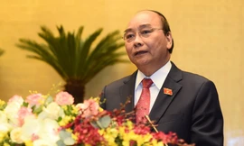 Thủ tướng Nguyễn Xuân Phúc báo cáo tại Quốc hội (ảnh Nhật Minh)