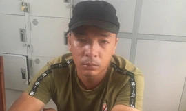 Phạm Viết Hùng tại cơ quan công an