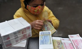 Tiền 200 đồng bị thổi giá