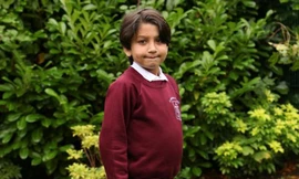 Cậu bé 8 tuổi có 'bụng bầu' 5 tháng