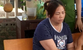 'Nữ quái' Ma Thị Tuyến cùng tang vật.