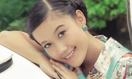 Diễn viên Kim Ngọc khoe dáng bên xế cổ