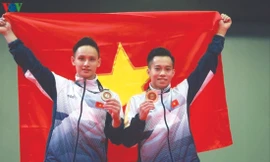 Thanh Tùng (phải) là VĐV thứ 2 của TTVN giành vé tham dự Olympic Tokyo 2020