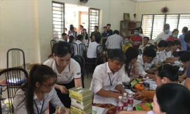 Người dân vùng dự án sân bay nhận tiền đền bù 