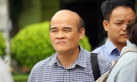 Ông Nguyễn Huy Quang - Vụ trưởng Vụ Pháp chế (Bộ Y tế) tại tòa