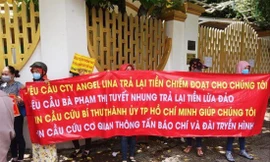 Nhiều người dân vây Cty Angel Lina đòi tiền 
